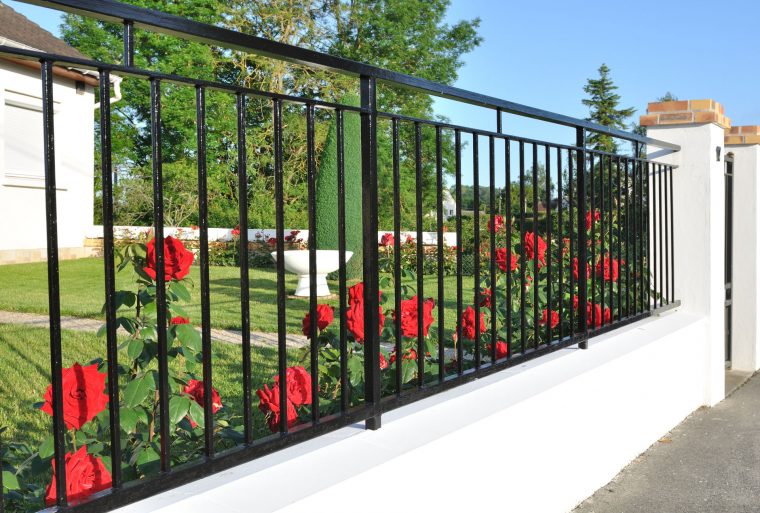 How to Make Your Fence Blend In With the Garden